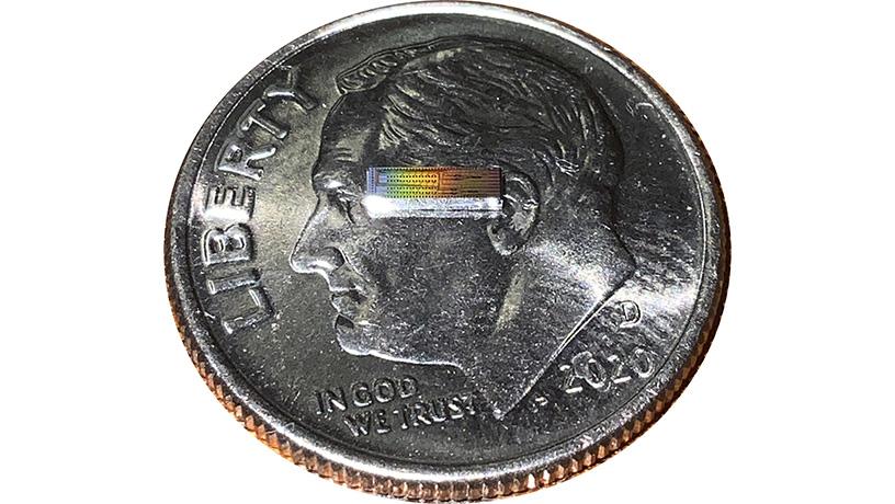 Photonic integrated chip on a dime