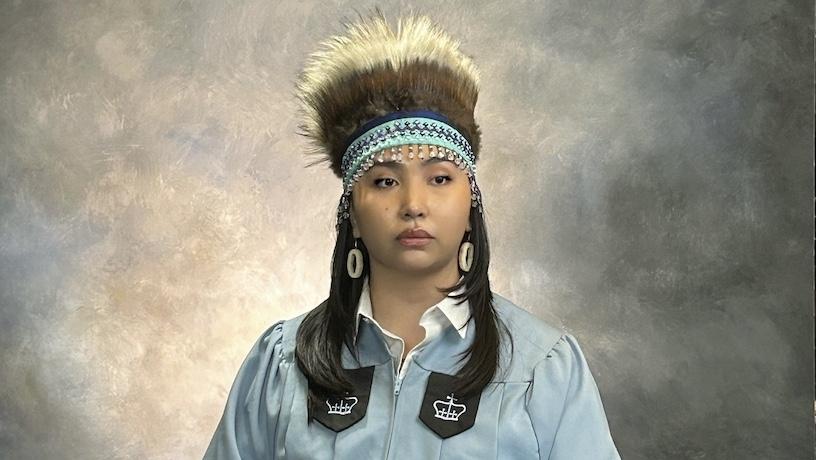 Charitie Ropati in a traditional yupik headdress and Columbia Engineering graduation regalia