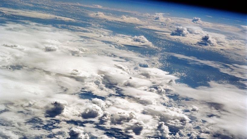 Clouds from deep convection over the tropical Pacific ocean, photographed by the space shuttle. Such convective activity drives the Hadley circulation of the atmosphere.