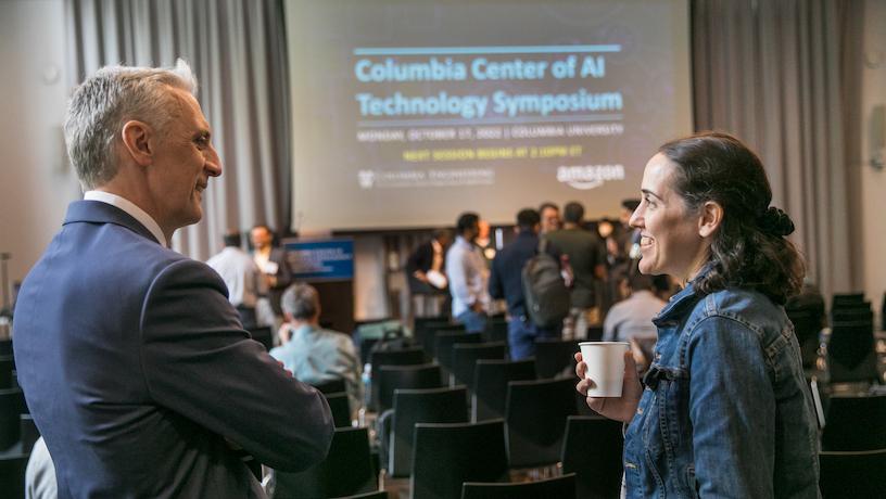 Attendees conversing at the 2022 Columbia Center of AI Technology Symposium