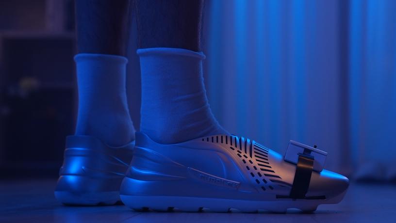 Glossy Surplex VR full-body tracking shoes on feet.