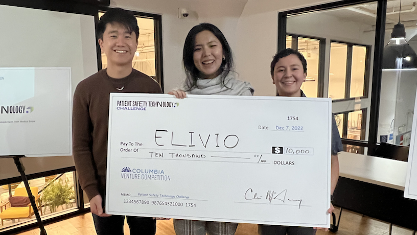The Elvio founders with a 10,000 competition check