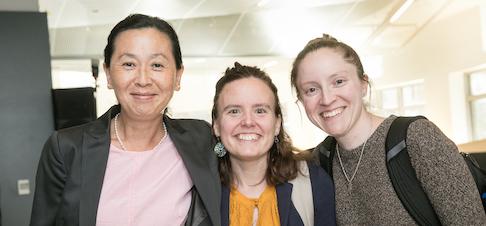 Three women smiling