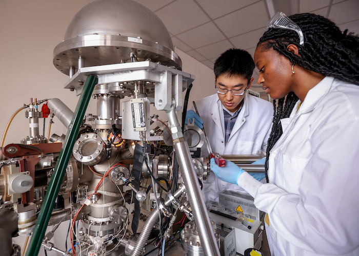 Researchers working in the lab