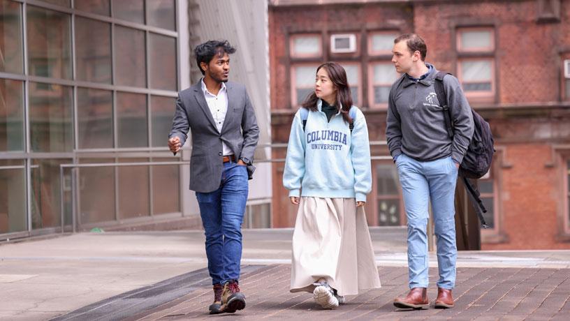 3 students walking