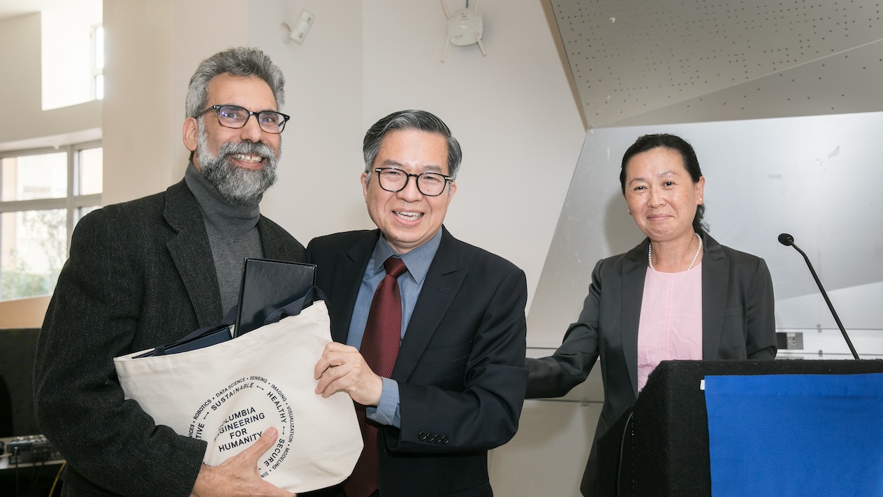 Dean Shih-Fu Chang and Helen Lu presenting Columbia Engineering faculty with an award