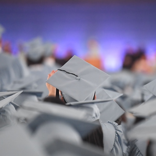 Columbia Engineering students wearing graduation caps
