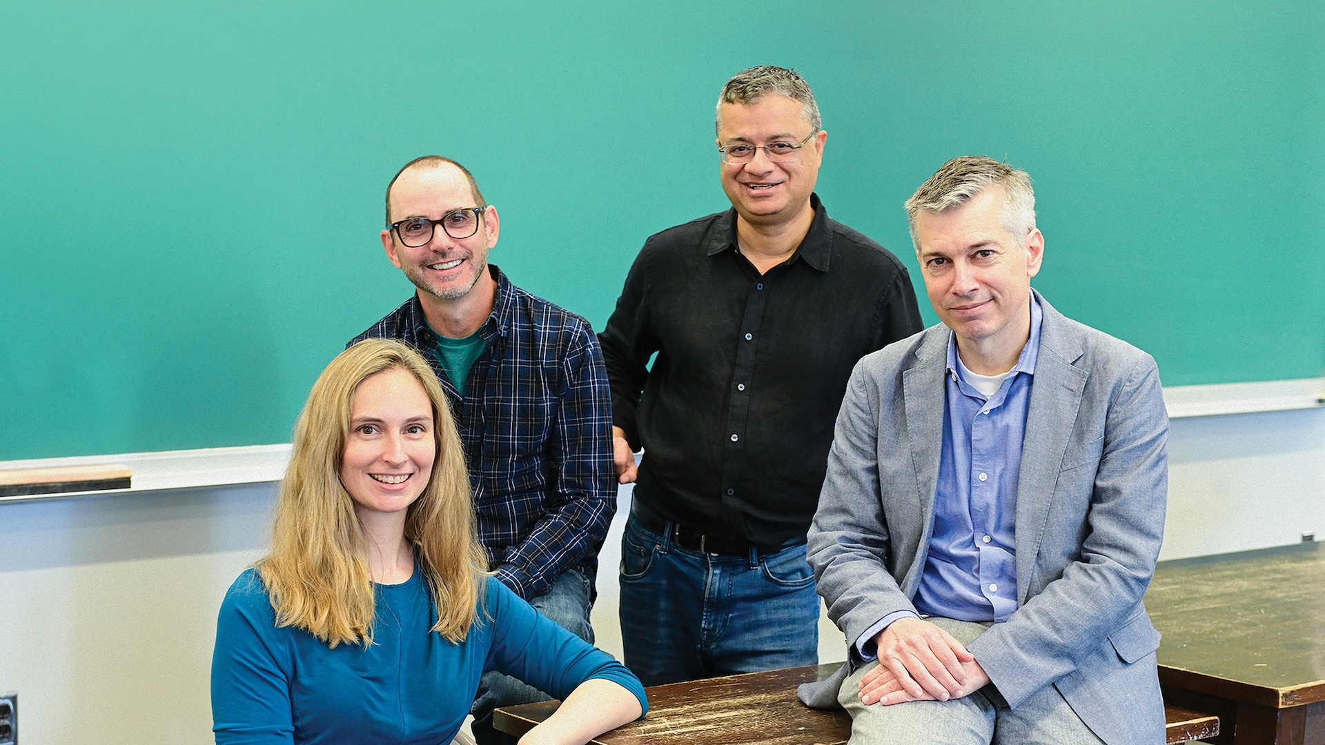 Lydia Chilton, Adam Cannon, Vishal Misra, and Chris Wiggins smiling for a photo