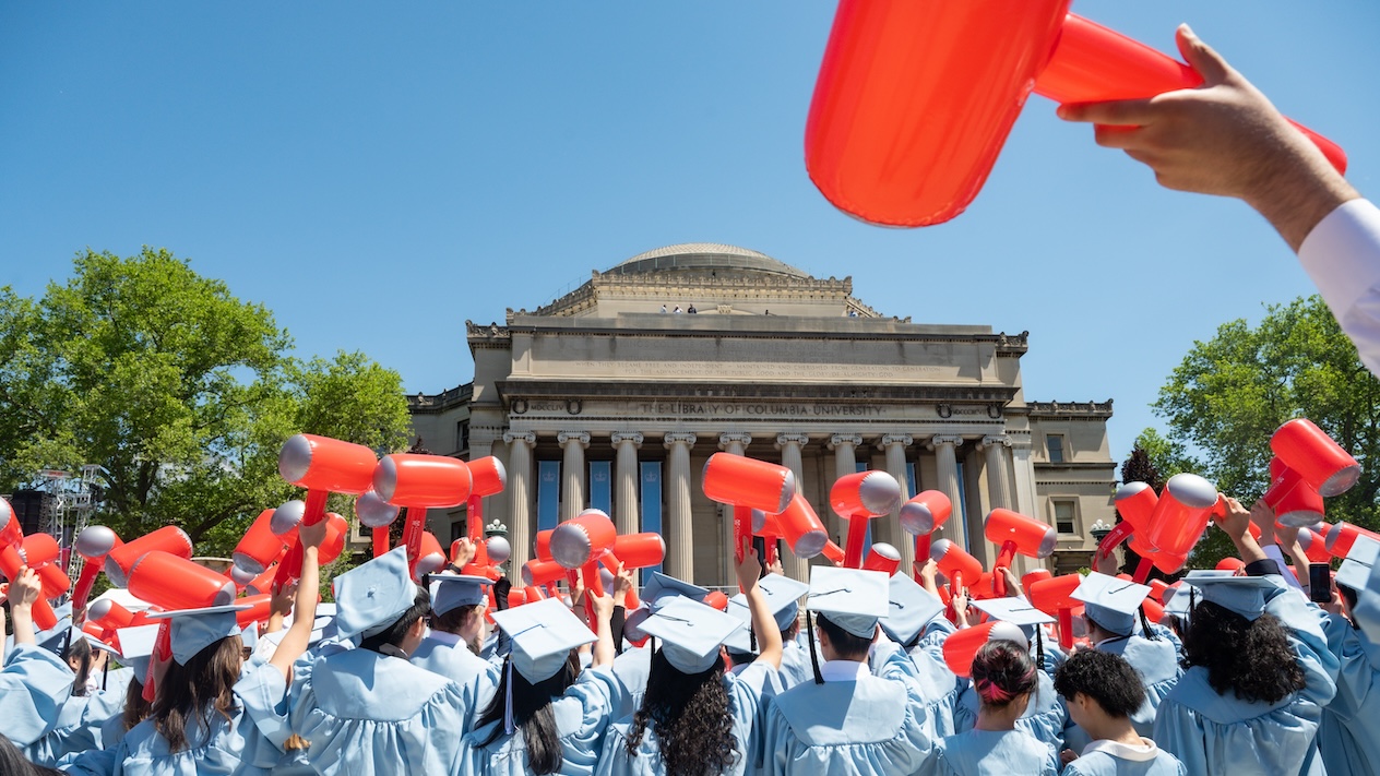 Columbia Engineering undergraduate students celebrating class day in front of Low Library
