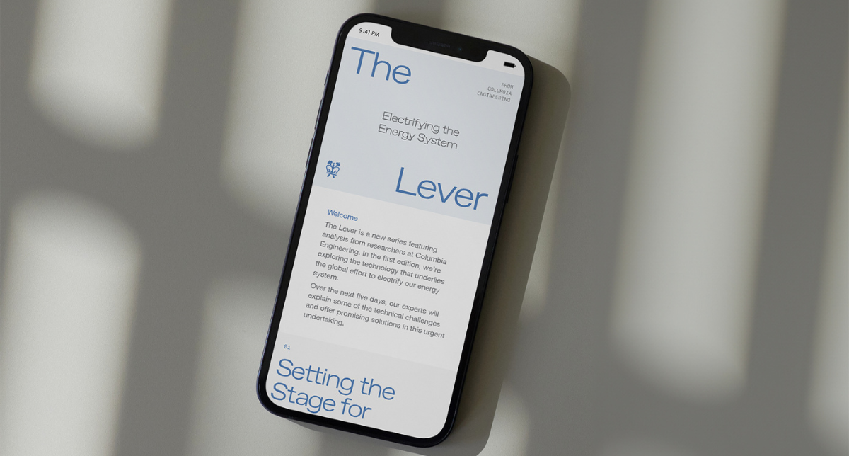 A smartphone with Columbia Engineering's "The Lever" digital magazine on the screen