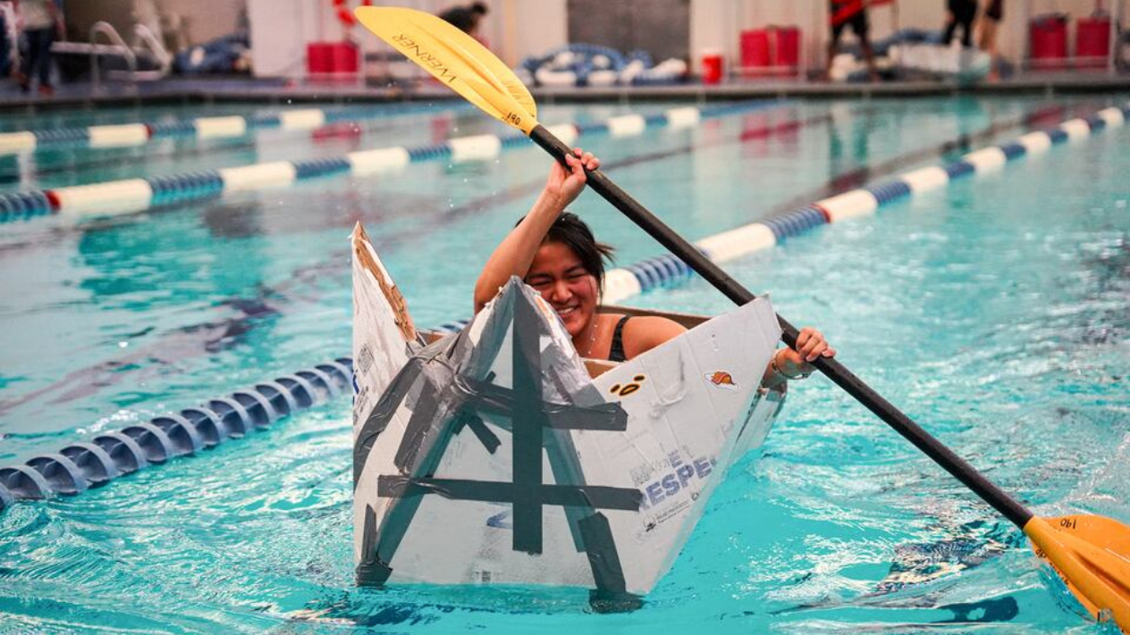 Student at the ESC Cardboard boat contest 