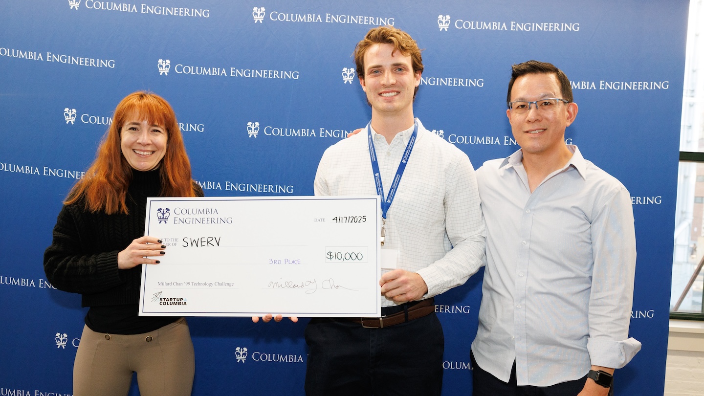 Three people smiling and holding a gaint, $10,000 check addressed to SWERV