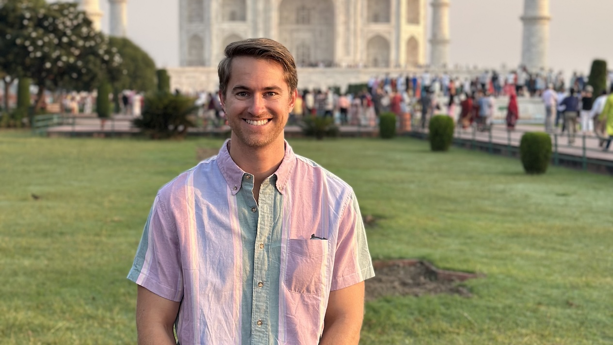 Kegan Vosteen posing for a picture outside the Taj Mahal