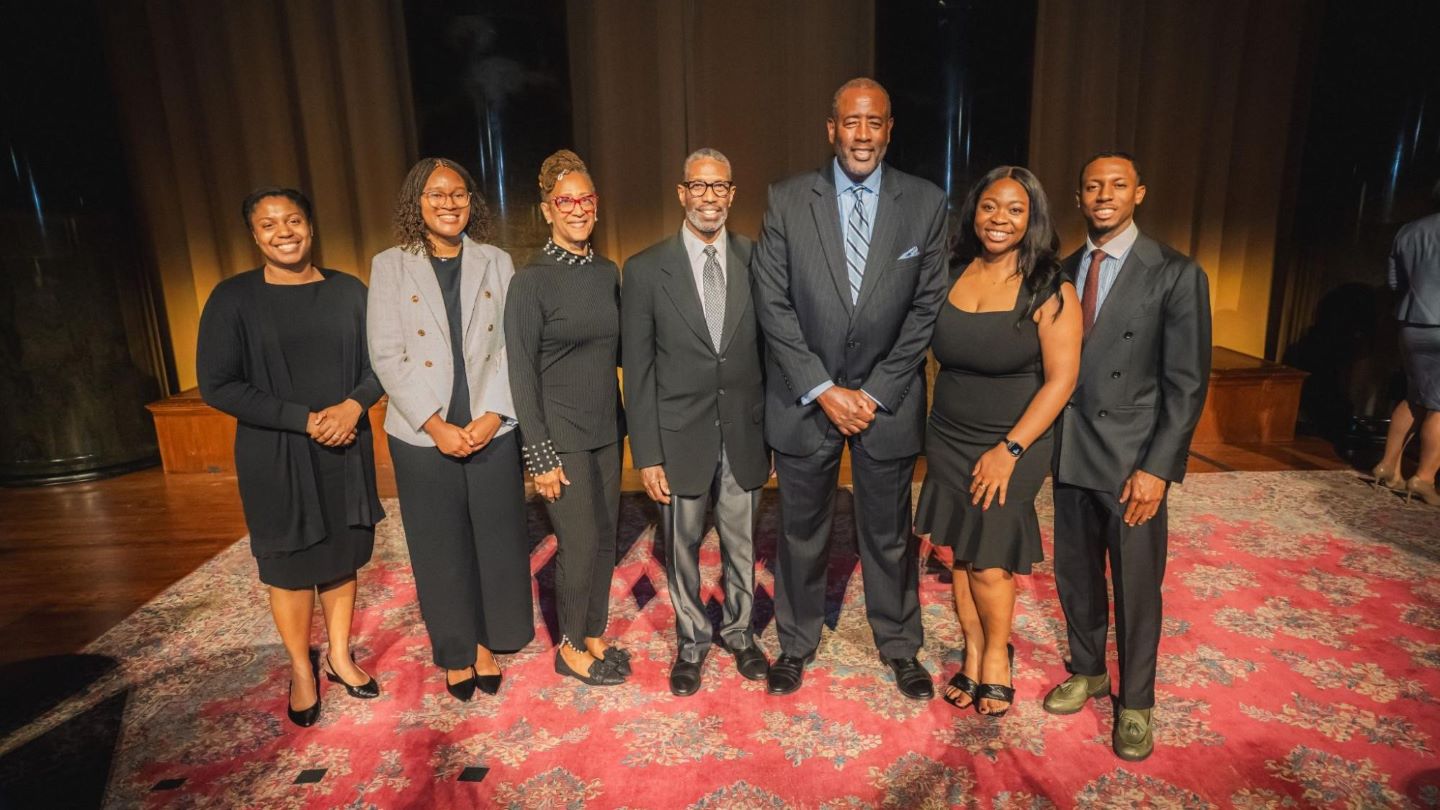Seven alums of Columbia's chapter of the National Society of Black Engineers posing for a photo