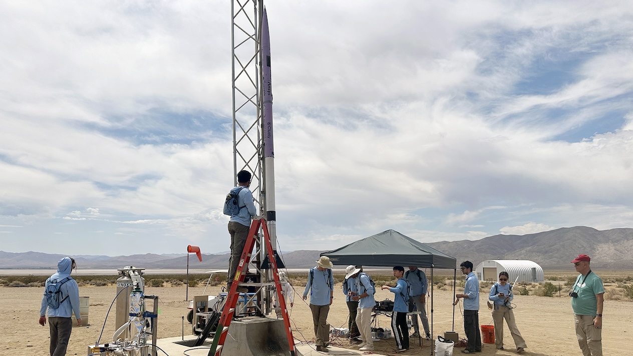 Columbia Space Initiative team preparing their rocket for launch in the desert