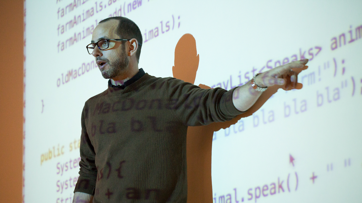 Adam Cannon, Teaching Professor of Computer Science, pictured teaching an introductory course in CS and programming