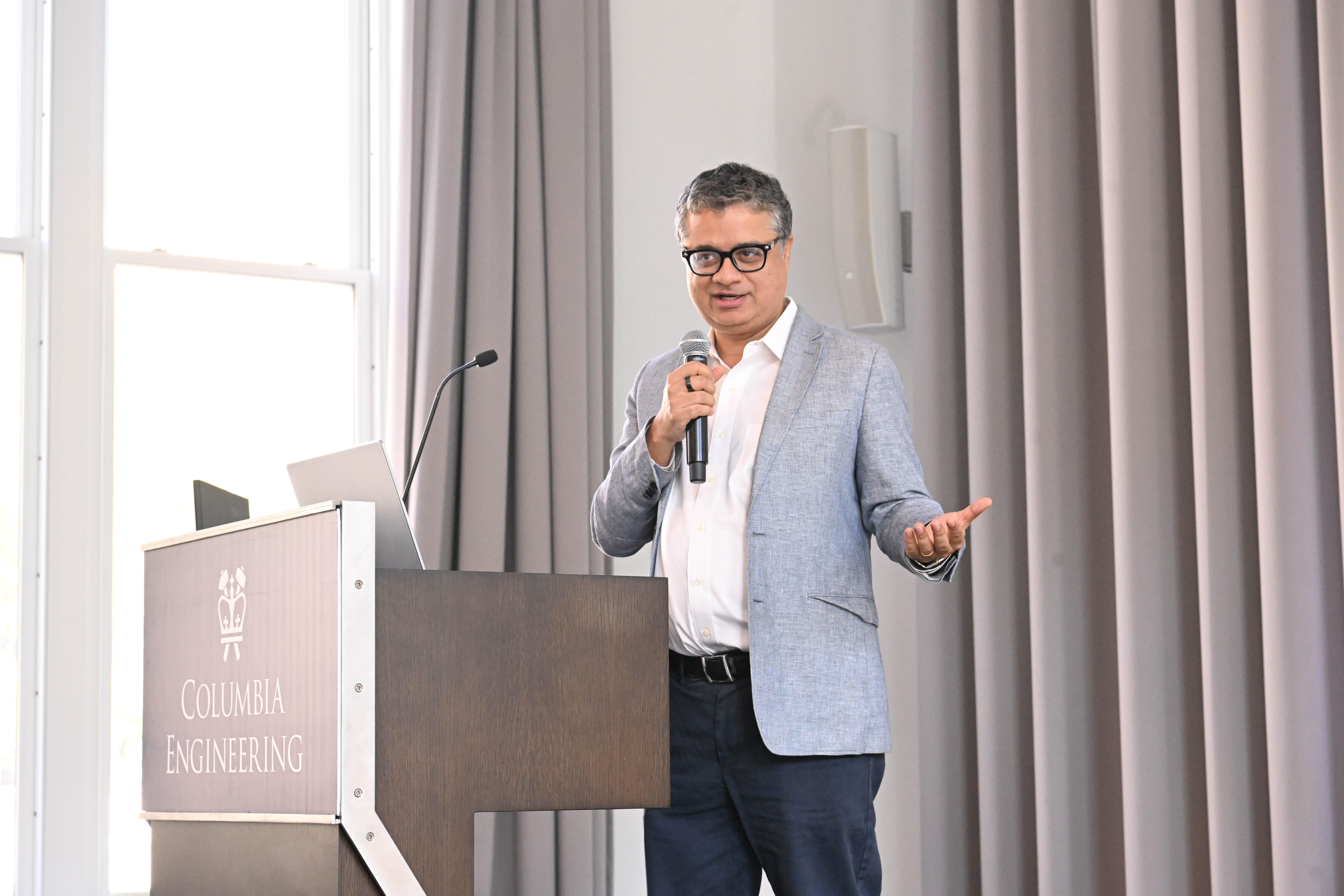 Vishal Misra, vice dean of computing and AI, giving a speech