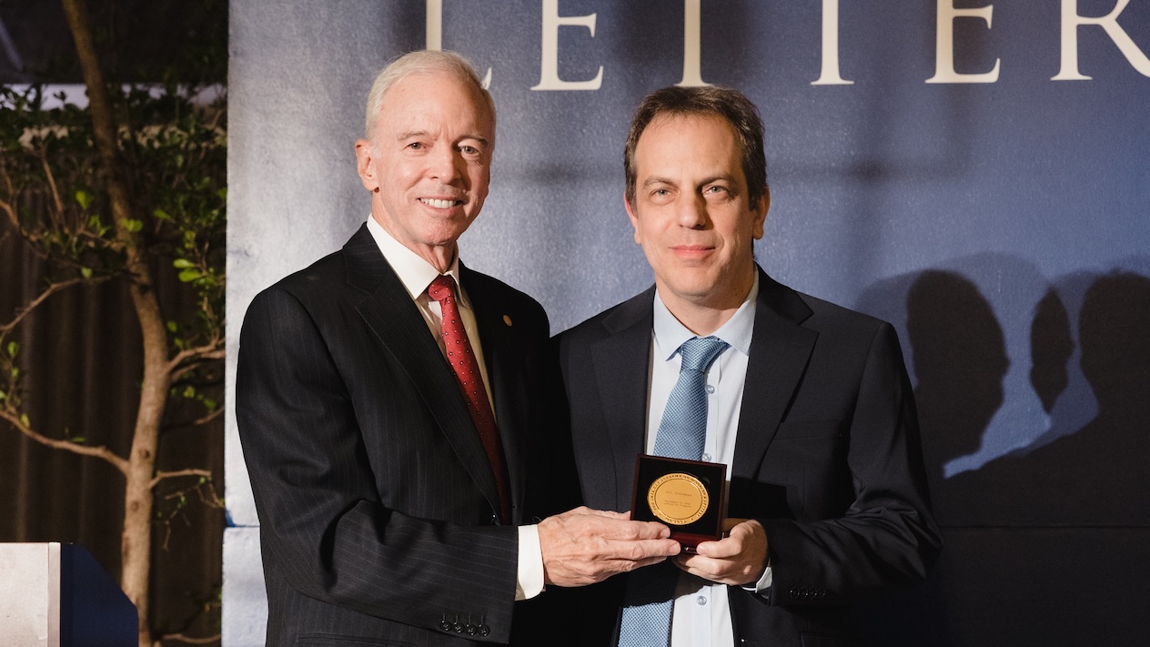 The networking expert was honored for his distinguished contribution to human learning.