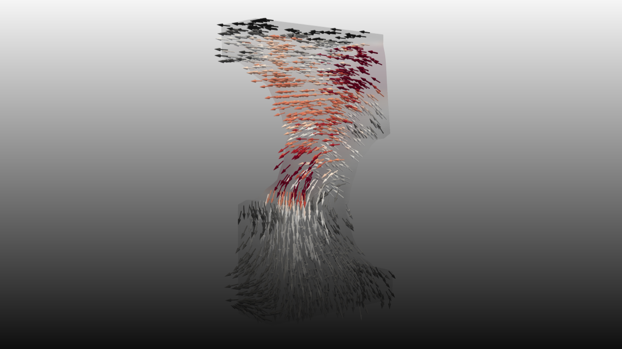 The arrows in this image represent displacement (with larger arrows indicating greater displacement) and the amount of stress (with red indicating high stress) of a given material.