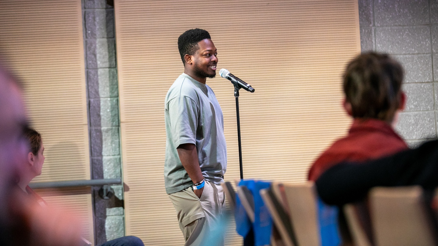 audience member speaking on a mic