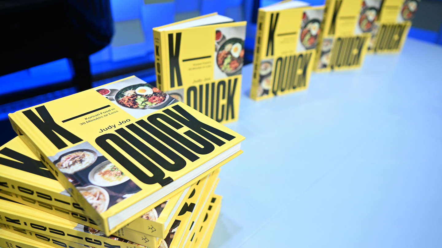 pictures of K-Quick books laid out on the table
