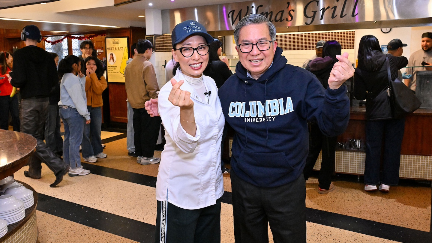 Judy Joo (left) posing with a finger heart, and Dean Shih Fu Chang (right) in a Columbia hoodie