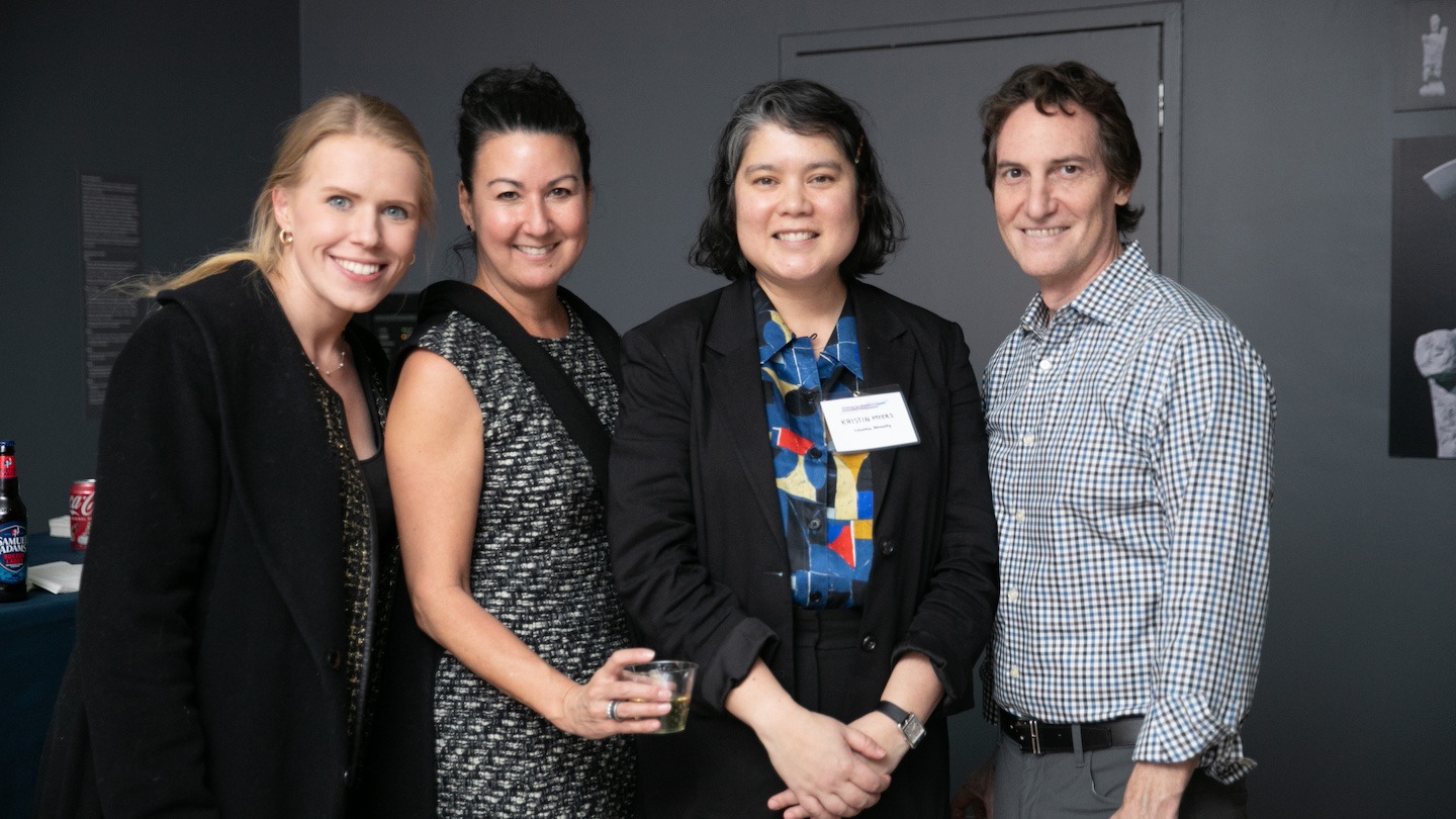 kristin myers (center, right) posed with 3 other people
