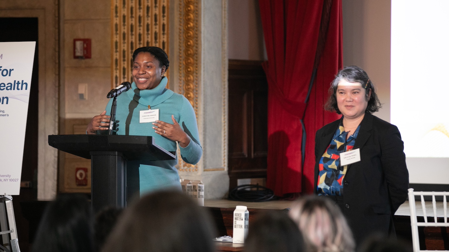 Faculty organizers Christine Hendon (foreground) and Kristin Myers kick off the Science for Women’s Health Innovation Symposium at Columbia University