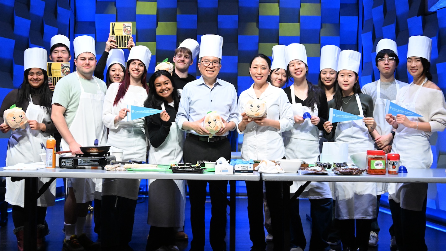Dean Shih Fu Chang (center, left) and Judy Joo (center, right) posed with students participating in a kimbap making session