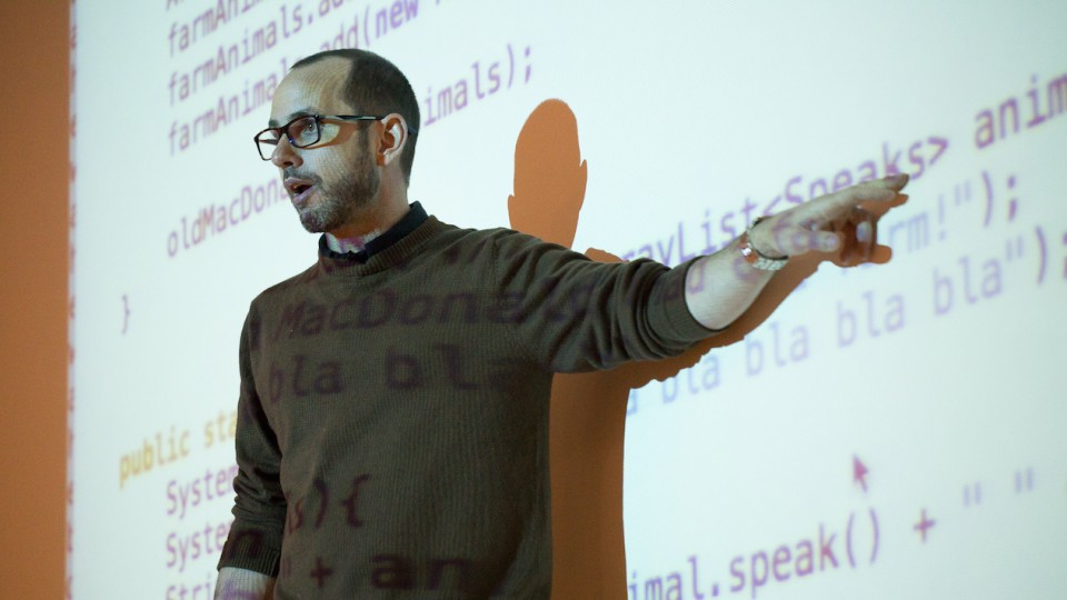 Adam Cannon, Teaching Professor of Computer Science, pictured teaching an introductory course in CS and programming