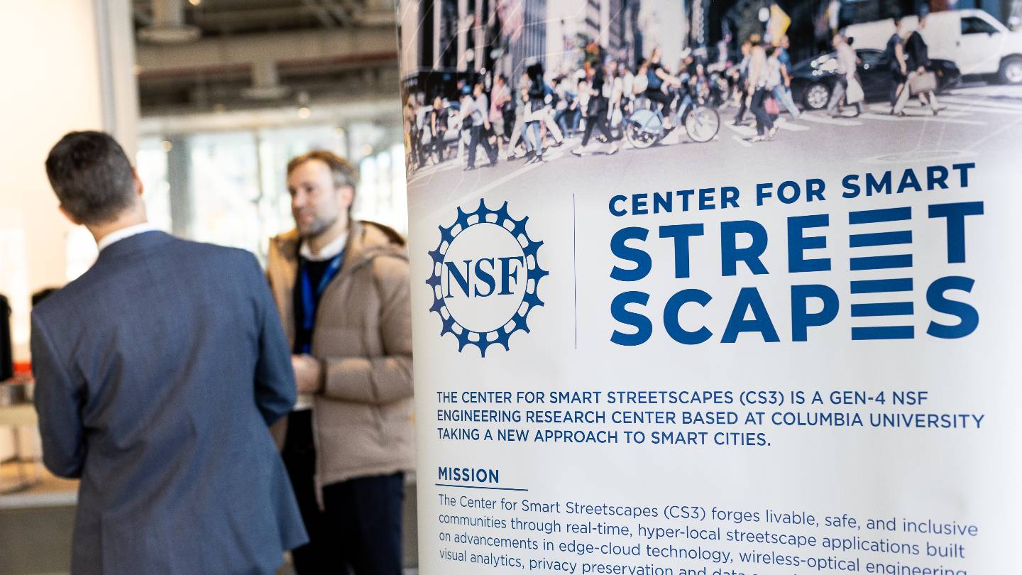 A poster that reads "Center for Smart Street Scapes. The Center for Smart Streetscapes (CS3) Is a Gen-4 NSF Engineering Research Center Based AT Columbia University Taking a New Approach to Smart Cities. Mission: The Center for Smart Streetscapes (CS3) forges livable, safe, and inclusive communities through real-time, hyper-local streetscape applications built on advancements in edge-cloud technology, wireless-optical engineering, visual analytics, privacy preservation, and..."