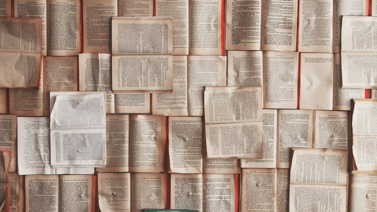 decorative banner of open books