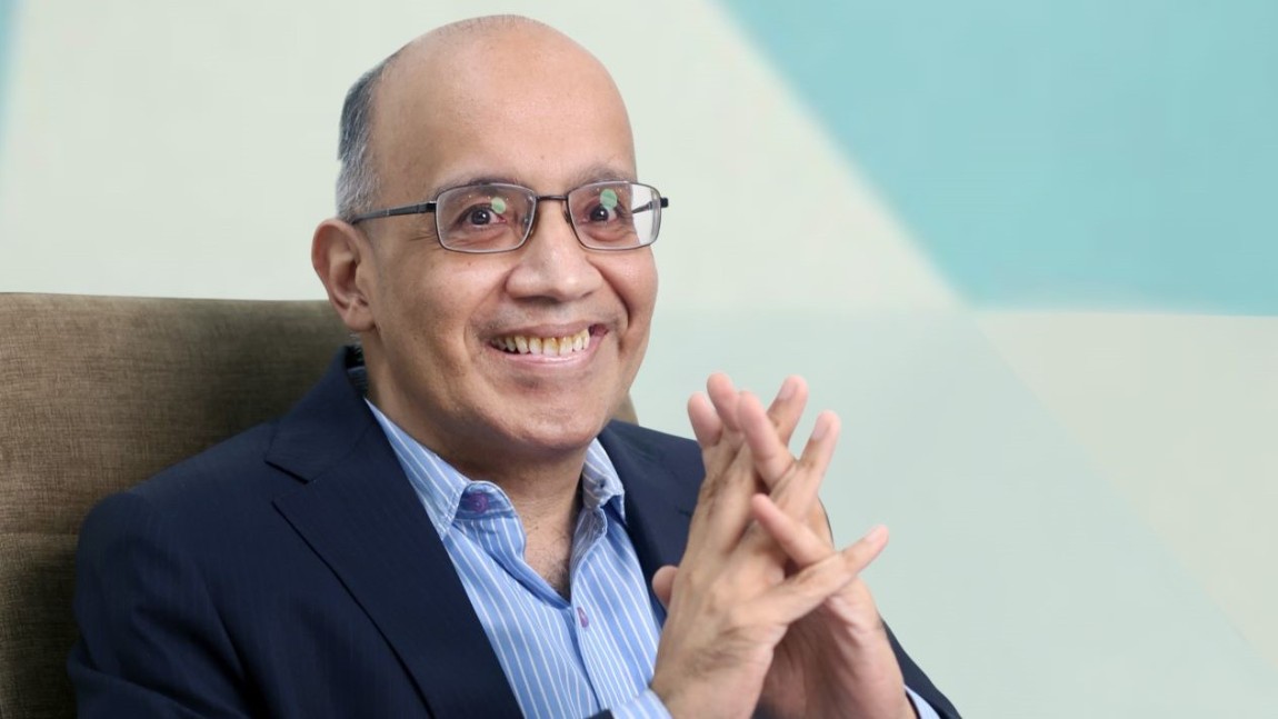 Rajesh Jain sitting in an arm chair