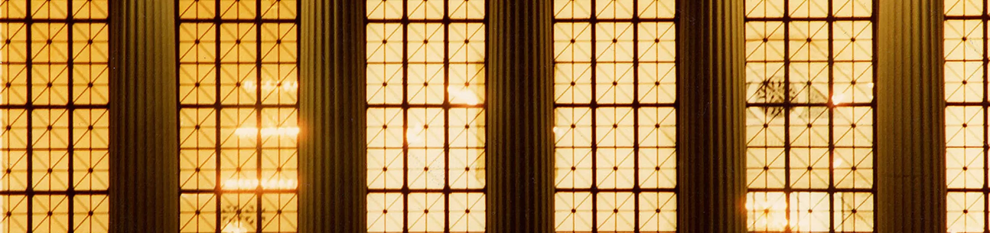 A photo of the windows of a campus building