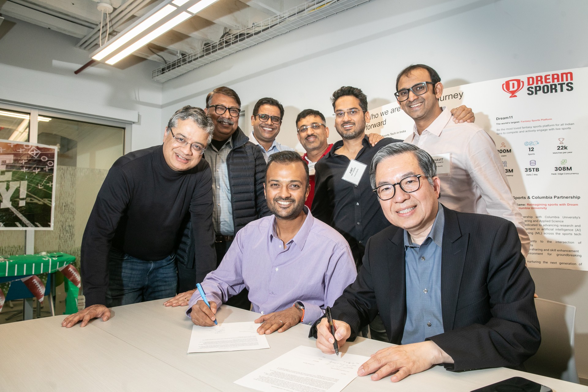 A group of engineers posing for a photo