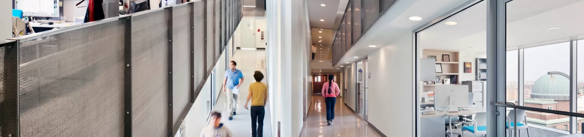Faculty and staff walk the halls of Columbia Engineering