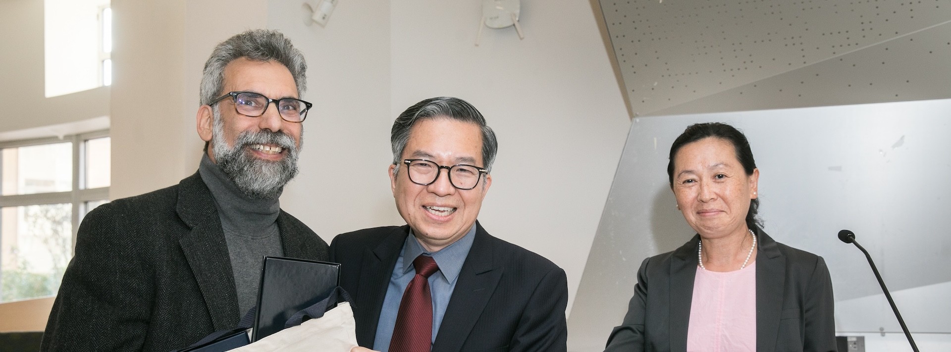 Dean Shih-Fu Chang, Helen Lu, and a Columbia Engineering faculty smiling for a photo
