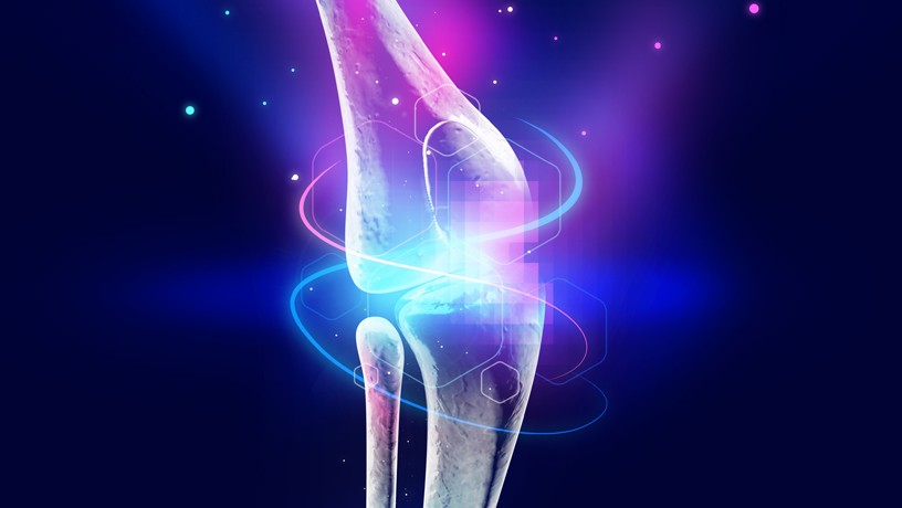 An illustration of a glowing knee joint