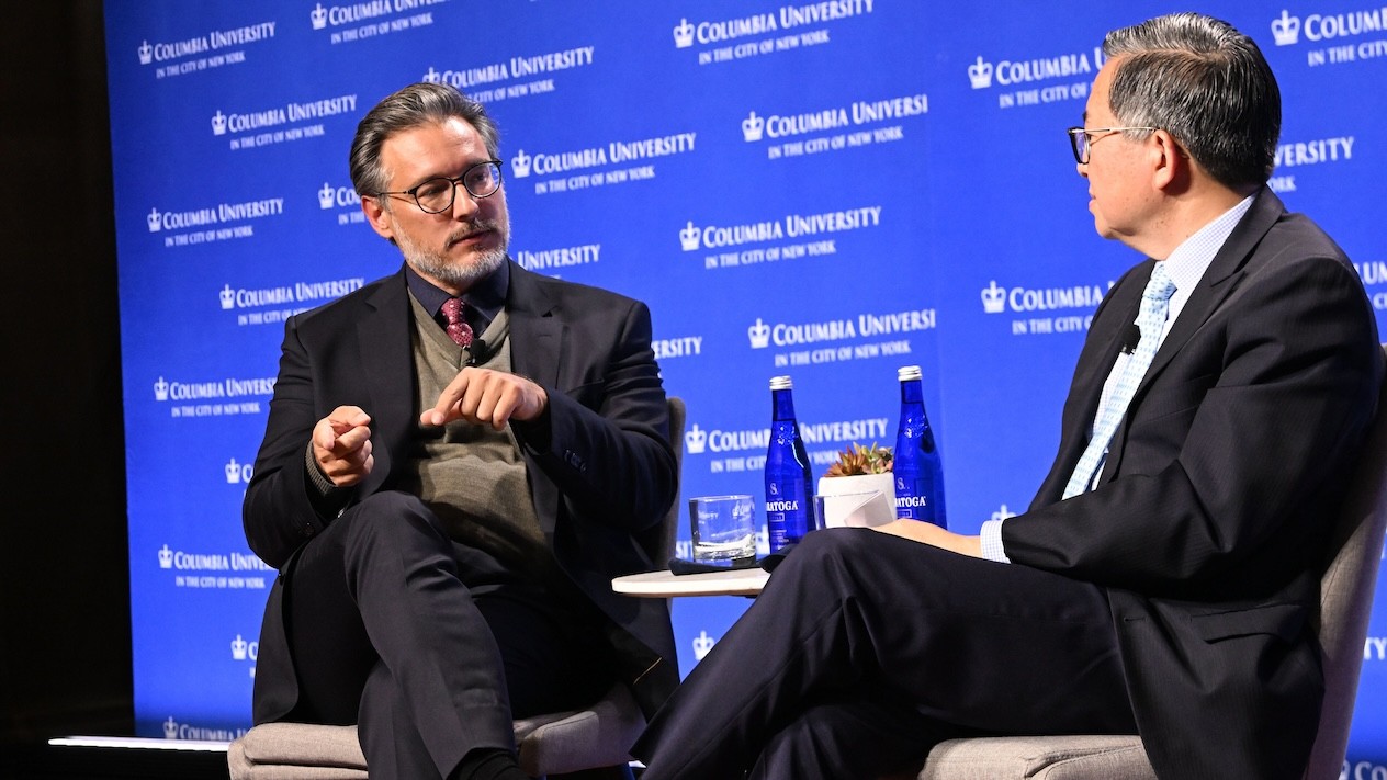 Sami Haddadin and Dean Shih-Fu Chang sitting on stage