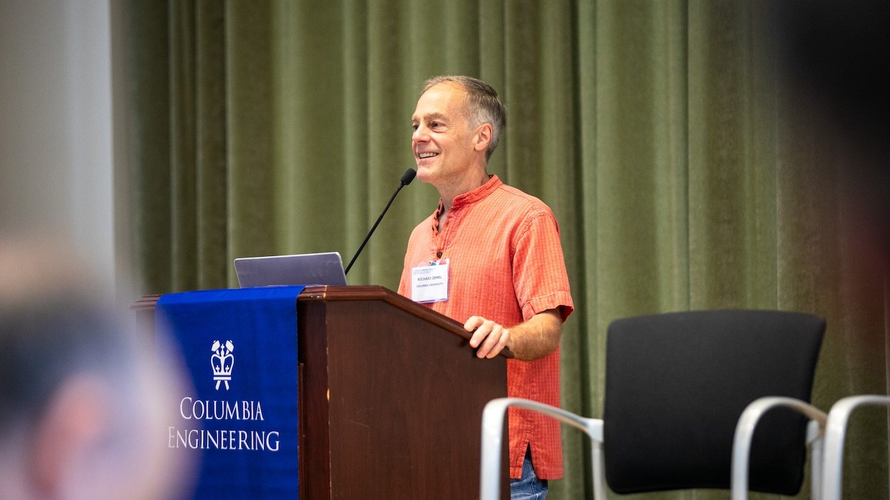 Richard Zemel standing at a podium with a Columbia Engineering logo