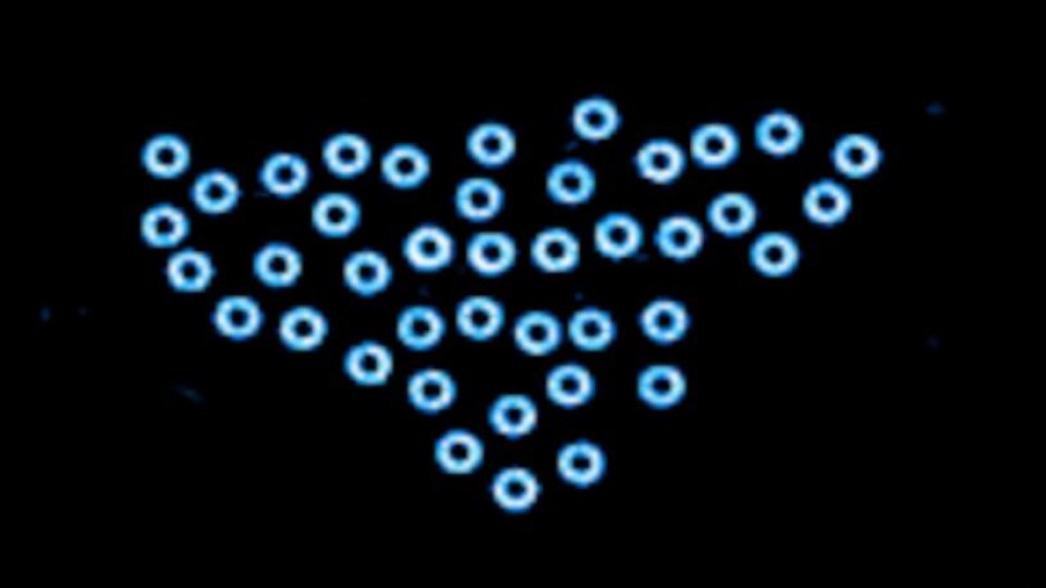 micron sphers dance together due to Quincke oscillaitons
