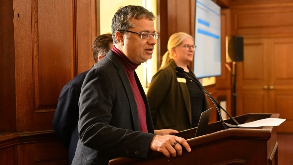 Vishal Misra speaking at a podium