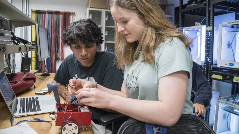robotics and autonomous driving students working on project