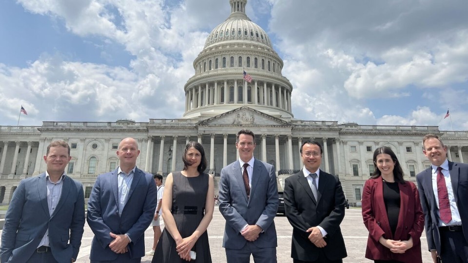 CS3 members standing in front of capitol hill