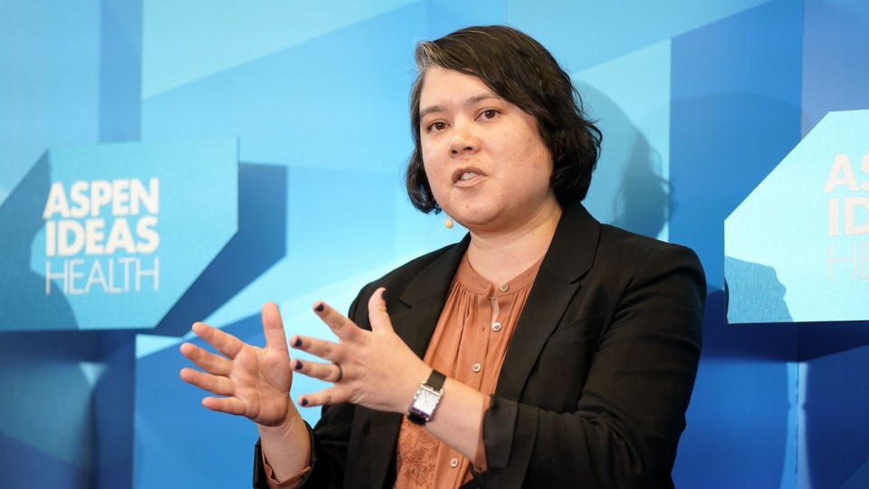 Kristin Myers speaking on a panel