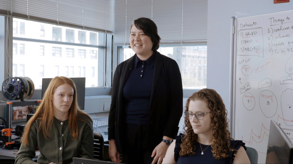 Kristin Myers (center) at work in the Myers lab at Columbia University
