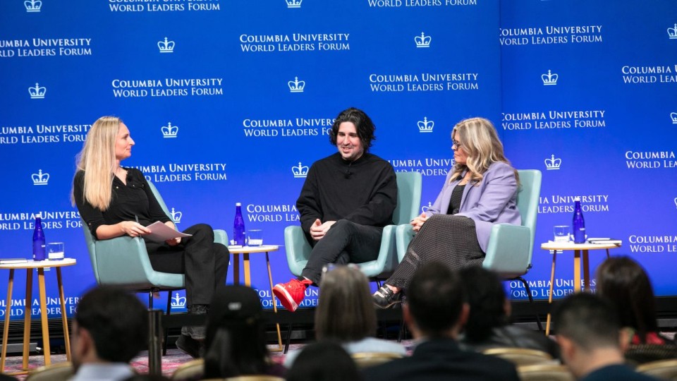 Lydia Chilton moderating a panel discussion with Anastasis Germanidis, who is speaking, and Jennifer Lee at the Columbia University World Leaders Forum.