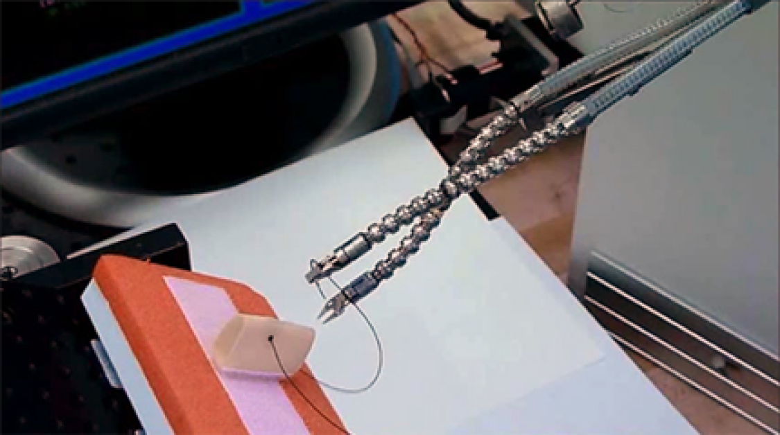 A robotic arm attached to tools