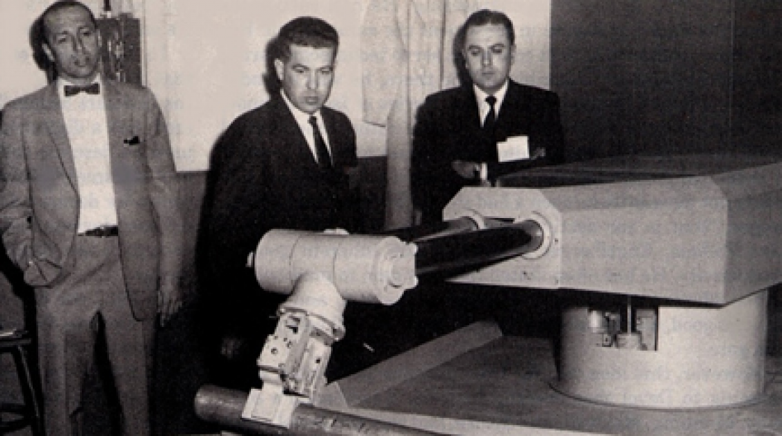 Men with an early robot