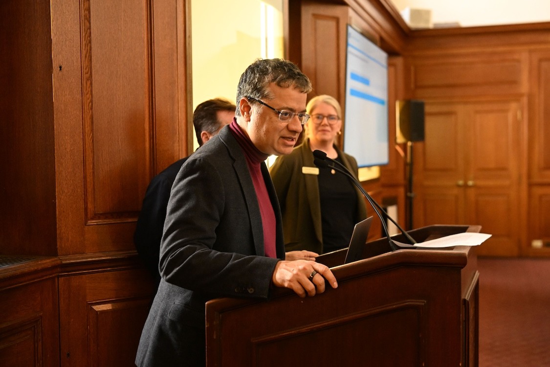 Vishal Misra speaking at a podium